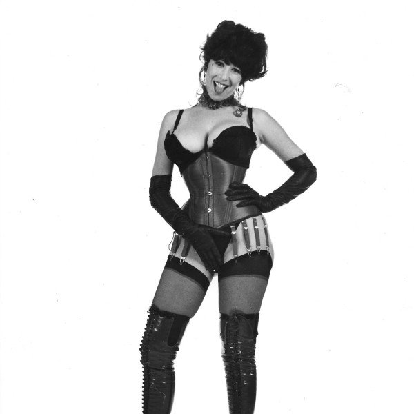Black-and-white of Annie Sprinkle wearing black lingerie